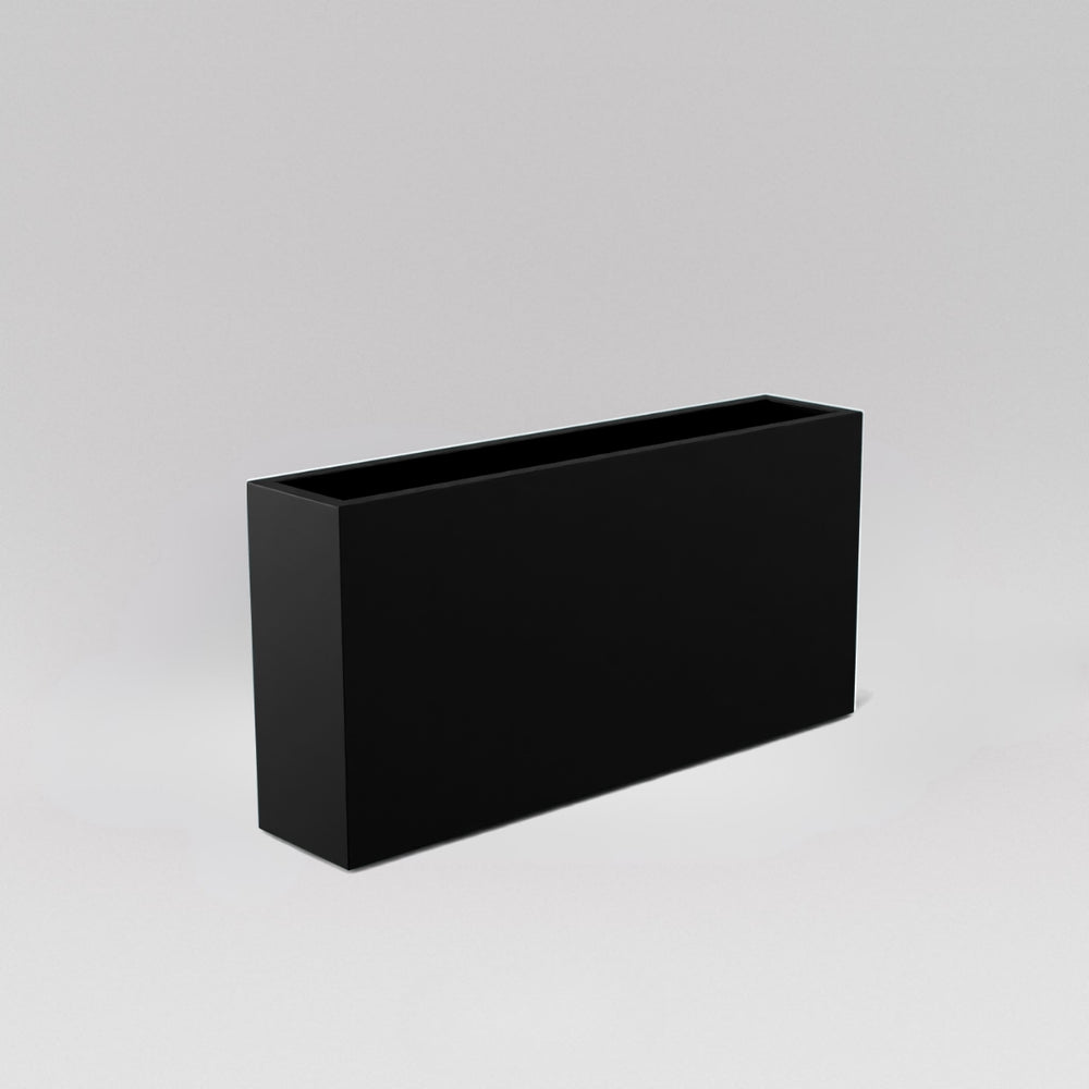 Milano Narrow Rectangle Planter in matte black against gray background.