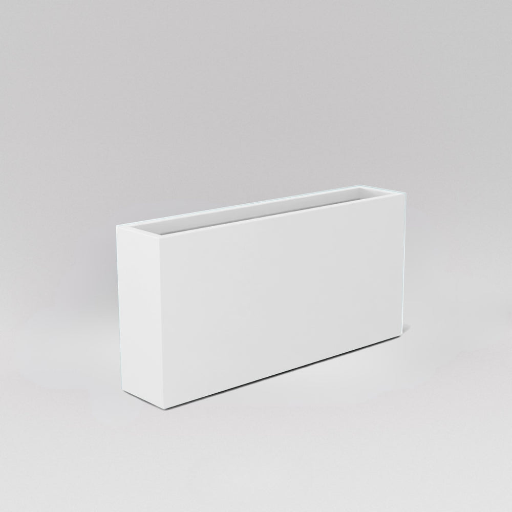 Milano Narrow Rectangle Planter in matte bright white against gray background. 