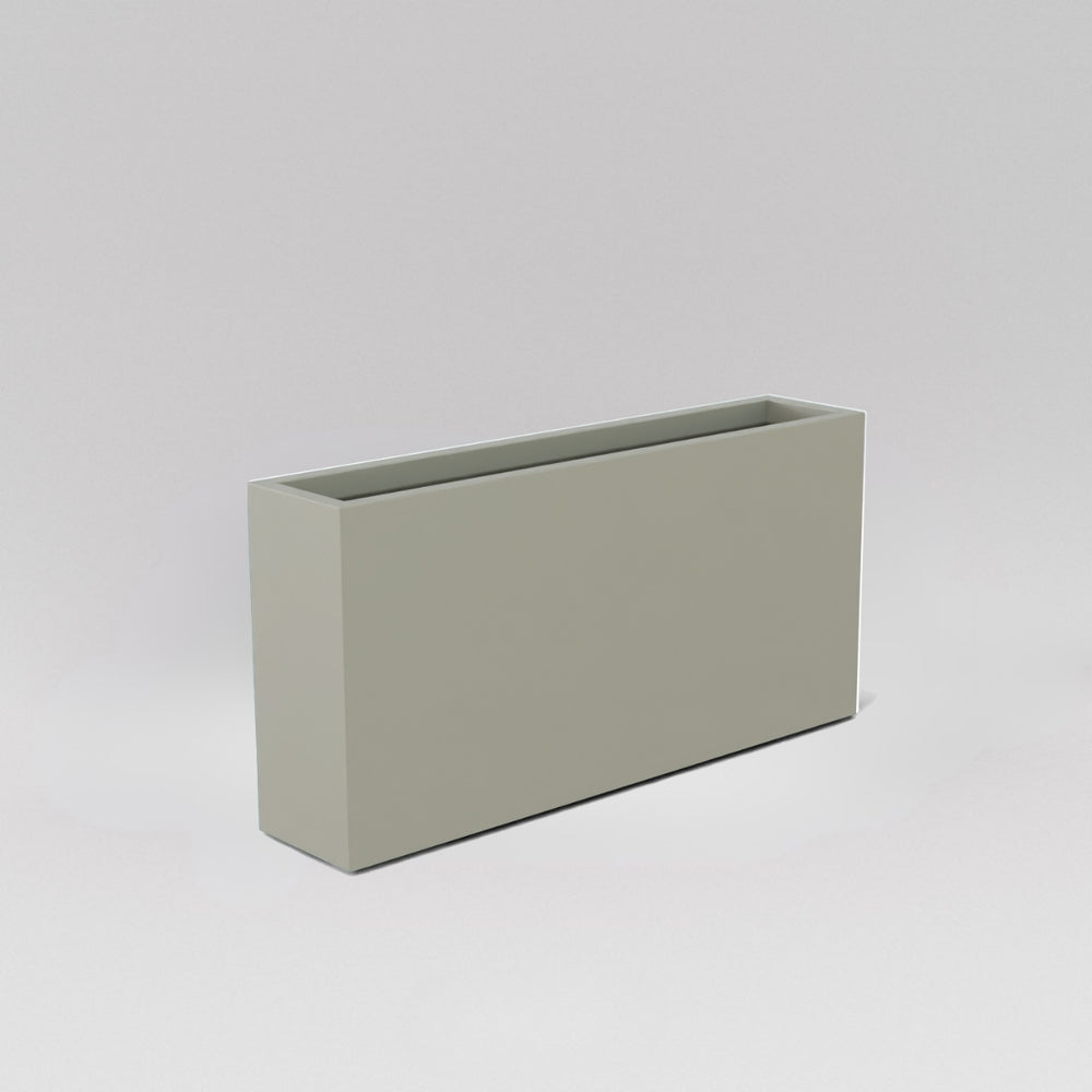  Milano Narrow Rectangle Planter in satin beige against gray background.