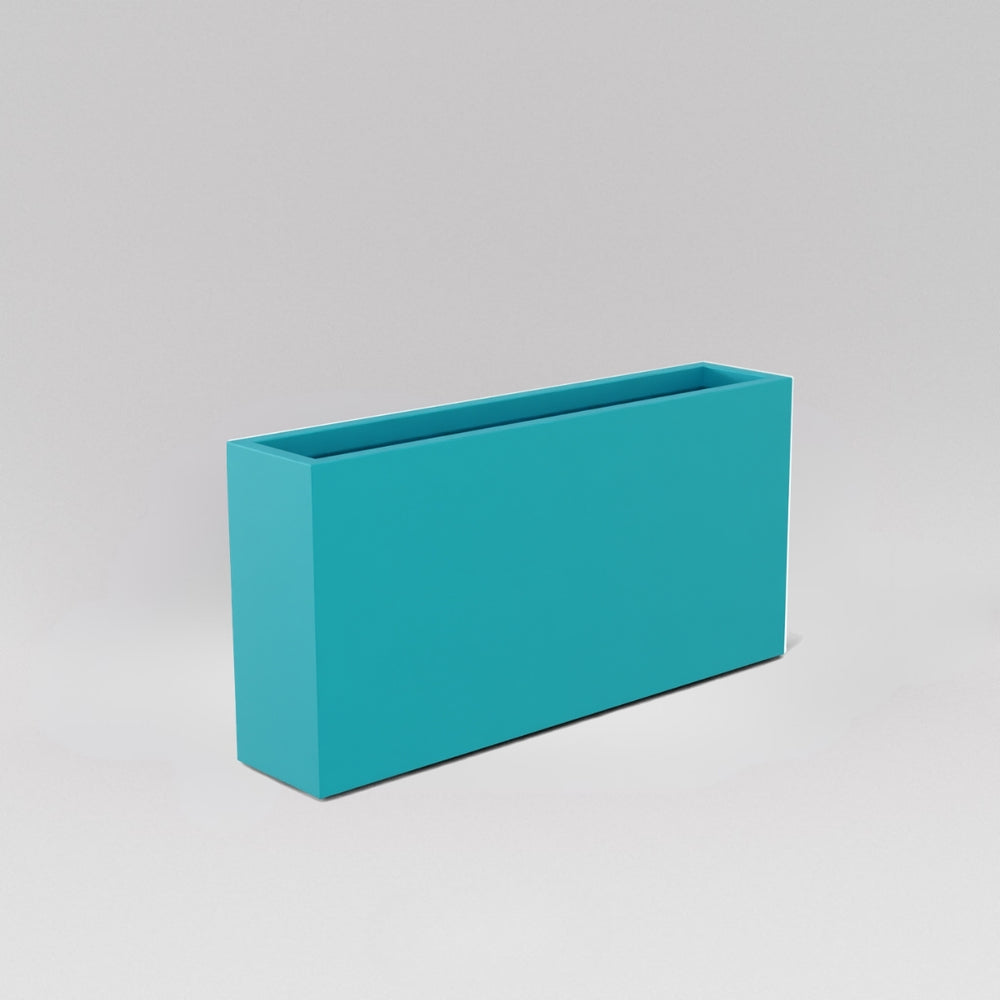 Milano Narrow Rectangle Planter in satin sea foam against gray background.