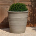 Mill Valley Planter, 24 inch on gravel filled with plants