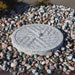 Millstone Fountain Kit Angled Style on mixed pebbles in action