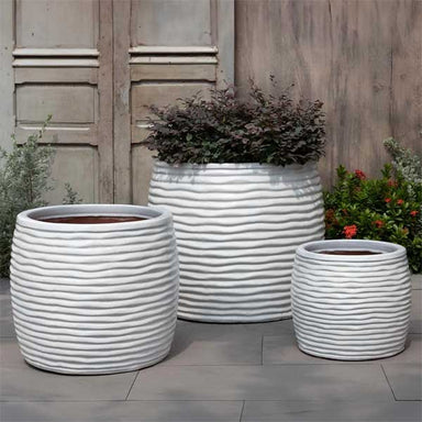 Montauk Planter, Tall - Antique White - S/3 on concrete filled with plants