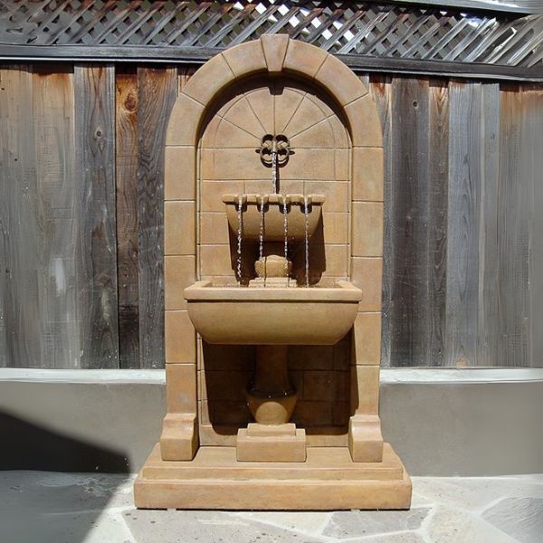 Monterosso Wall Fountain in action in the backyard.