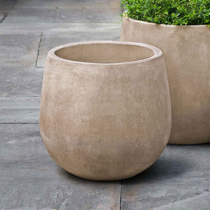 Montrose Planter in Brown filled with plants