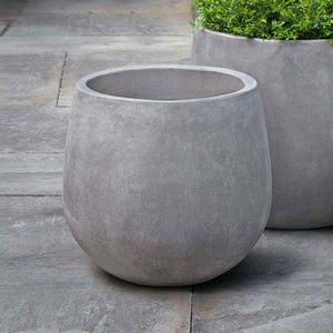 Montrose Planter in Grey filled with plants