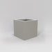 Montroy Cube Fiberglass Planter in matte cement gray against white background.