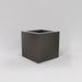 Montroy Cube Fiberglass Planter in matte gunmetal against gray background.