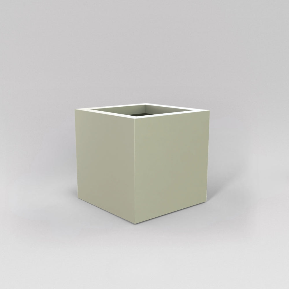 Montroy Cube Fiberglass Planter in satin beige against gray background.