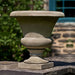 Mt. Airy Urn Planter on ledge in the backyard