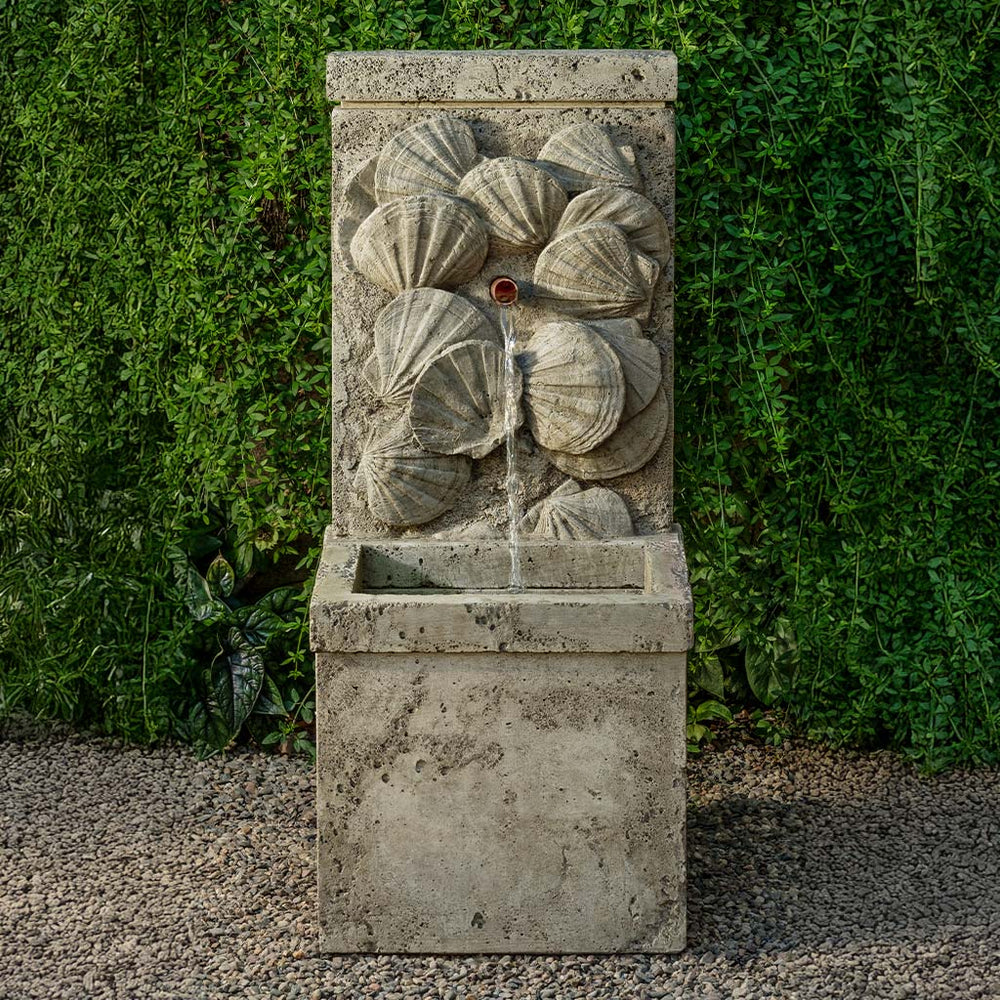 Nassau Wall Fountain on gravel in action.