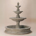 Newcastle Three Tier Pond Fountain against brown background.