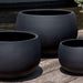 Norfolk Planter, Large in onyx black lite in the backyard