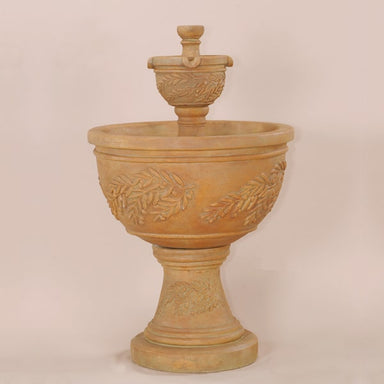 Oliva Two Tier Fountain against brown background.