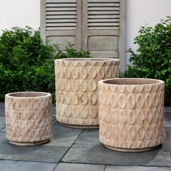 Oriel Planter in Antico Terra Cotta on concrete in the backyard.