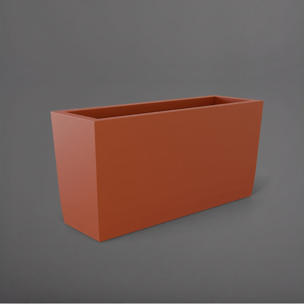 Panama Tapered Rectangle Planter in matte terra cotta against gray background.