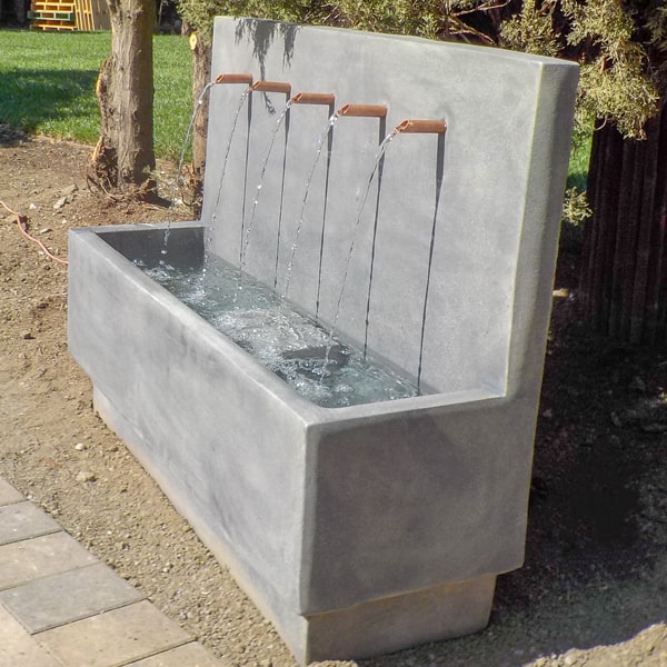 Penta Wall Fountain in action in the backyard.
