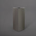 Perth Tall Corner Fiberglass Planter in matte gunmetal against gray background.