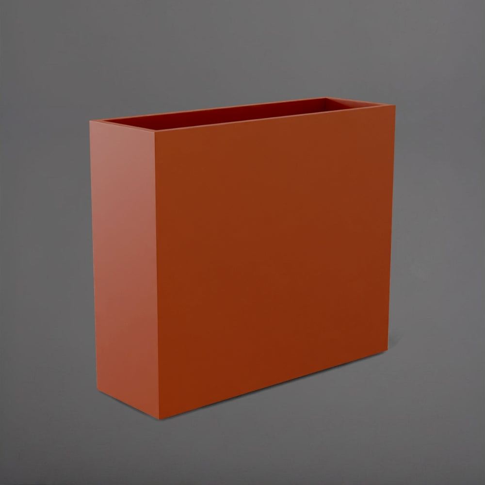 Perth Tall Rectangle Fiberglass Planter in matte terra cotta against gray background.