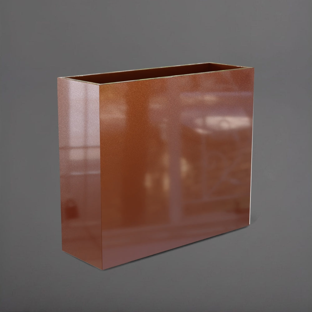 Perth Tall Rectangle Fiberglass Planter in metallic bronze against gray background.
