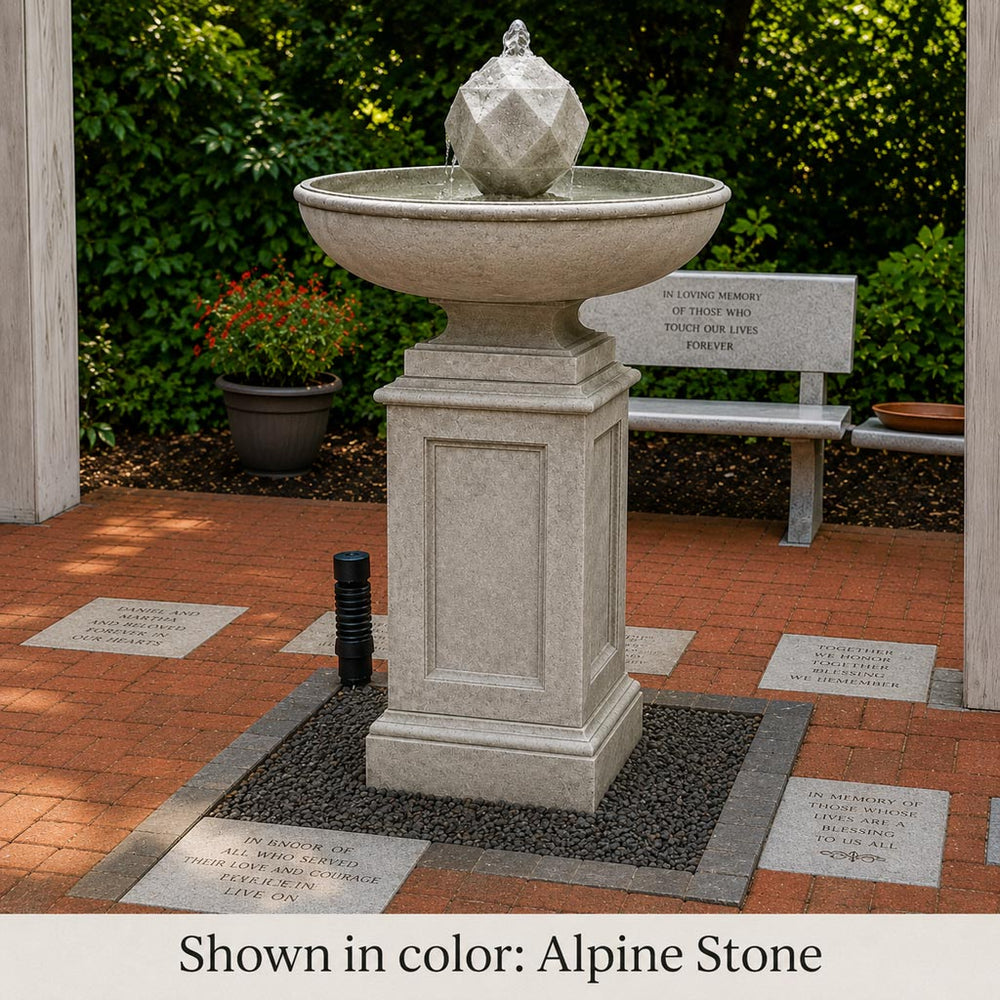 Polyhedron Fountain on gravel against concrete bench upclose