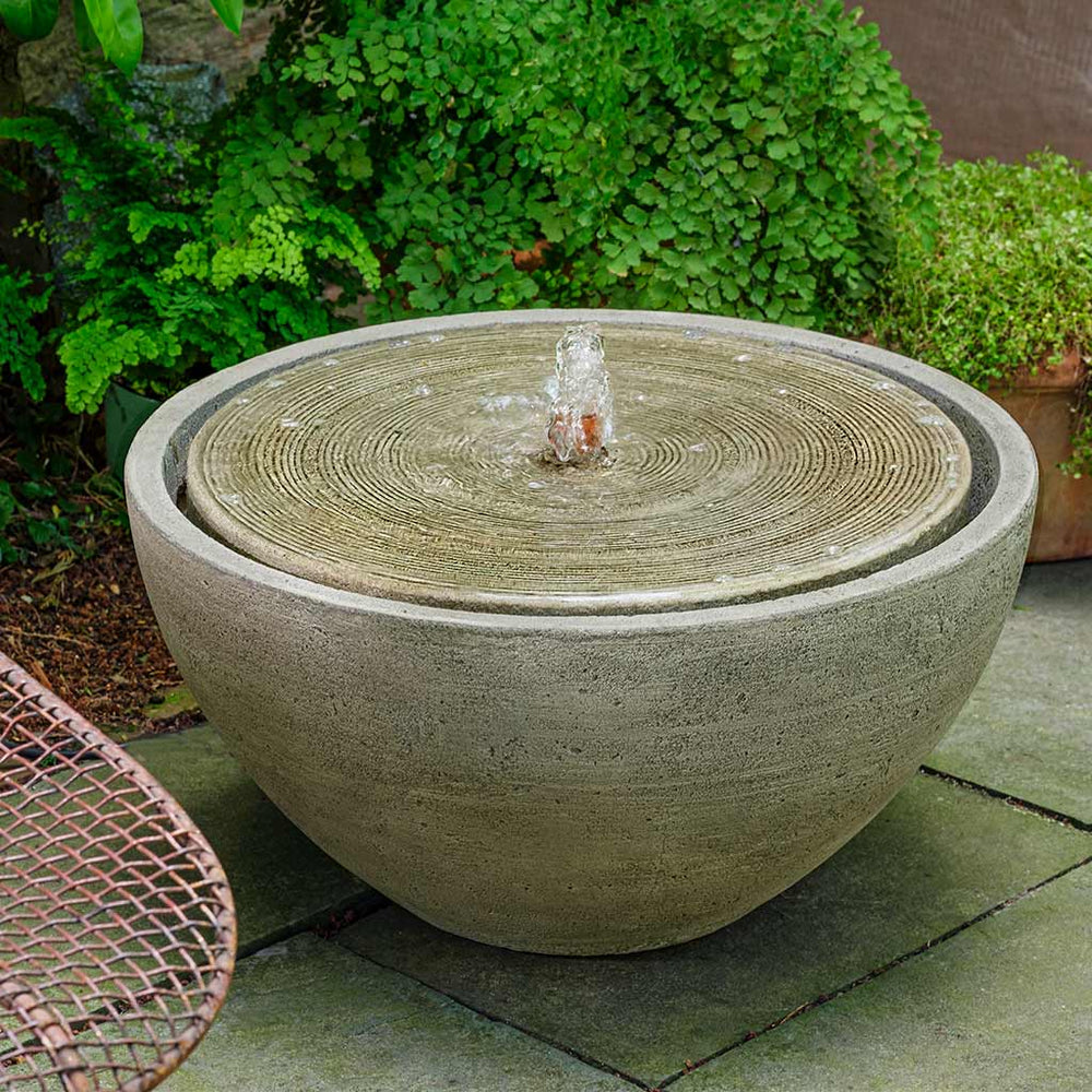 Portola Water Fountain Bubbler in action on stone patio