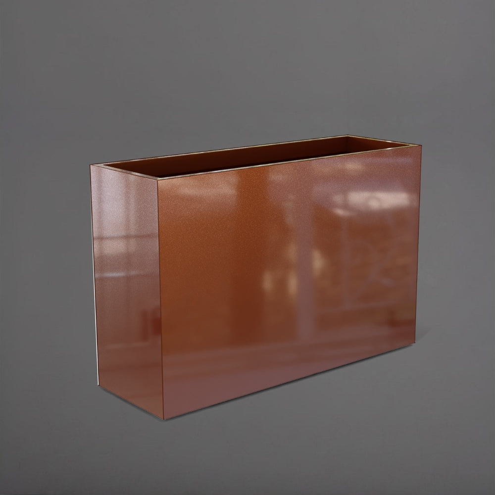 Potsdam Rectangle Fiberglass Planter in metallic bronze against gray background.