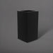 Potsdam Tall Corner Fiberglass Planter in matte black against gray background.