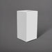 Potsdam Tall Corner Fiberglass Planter in matte bright white against gray background.