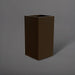 Potsdam Tall Corner Fiberglass Planter in matte bronze against gray background.
