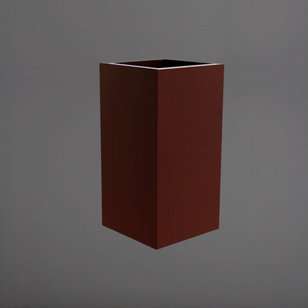Potsdam Tall Corner Fiberglass Planter in matte dark brown against gray background.