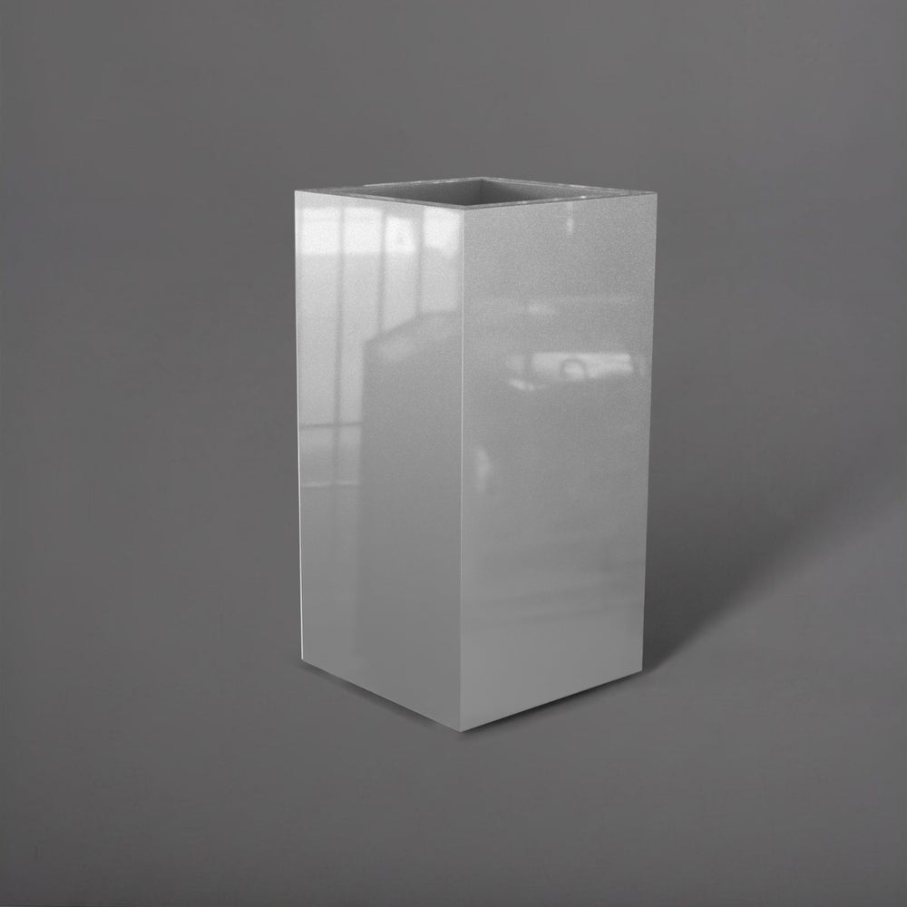 Potsdam Tall Corner Fiberglass Planter in metallic silver against gray background.