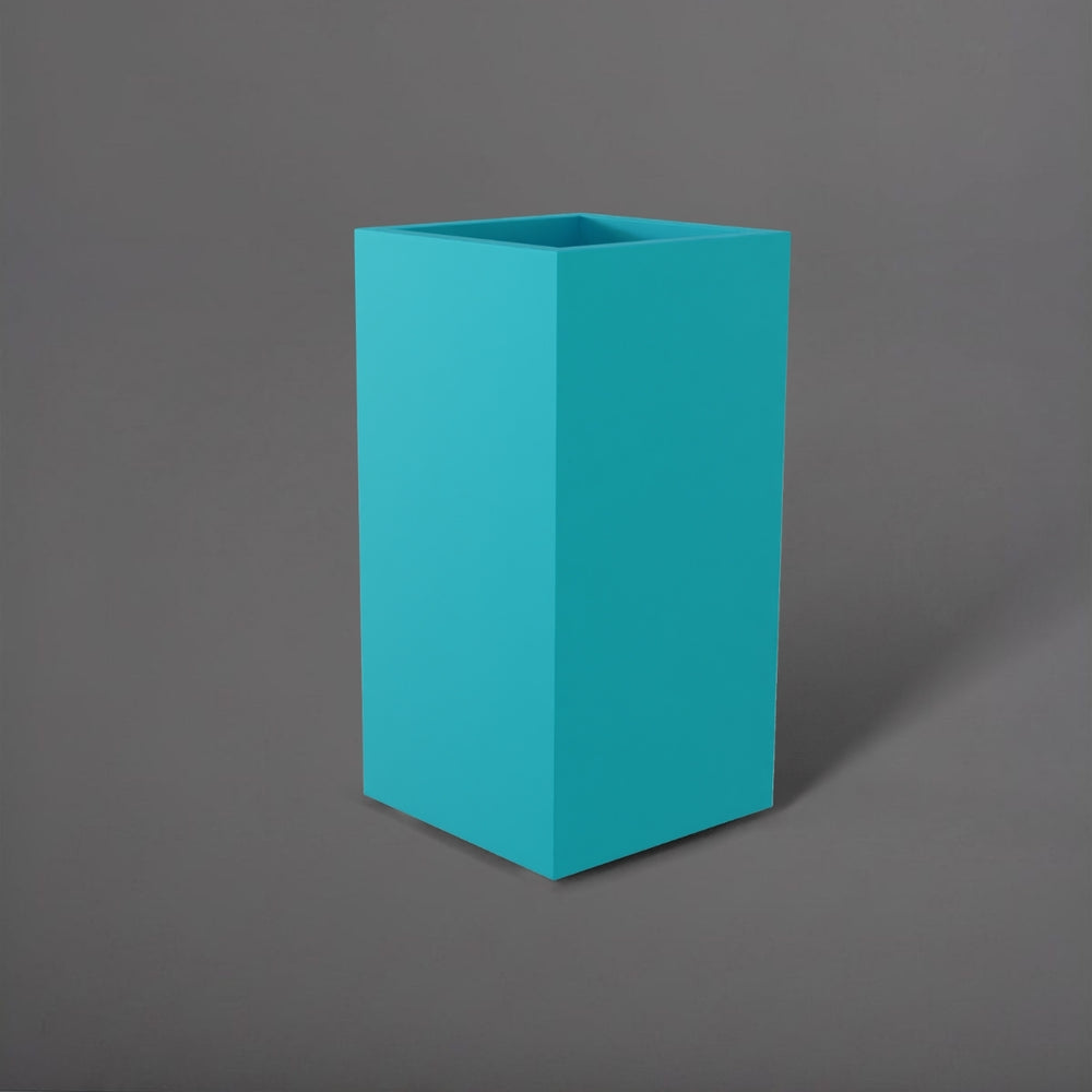 Potsdam Tall Corner Fiberglass Planter in satin seafoam green against gray background.