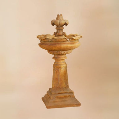 Rialto Fountain against brown background.