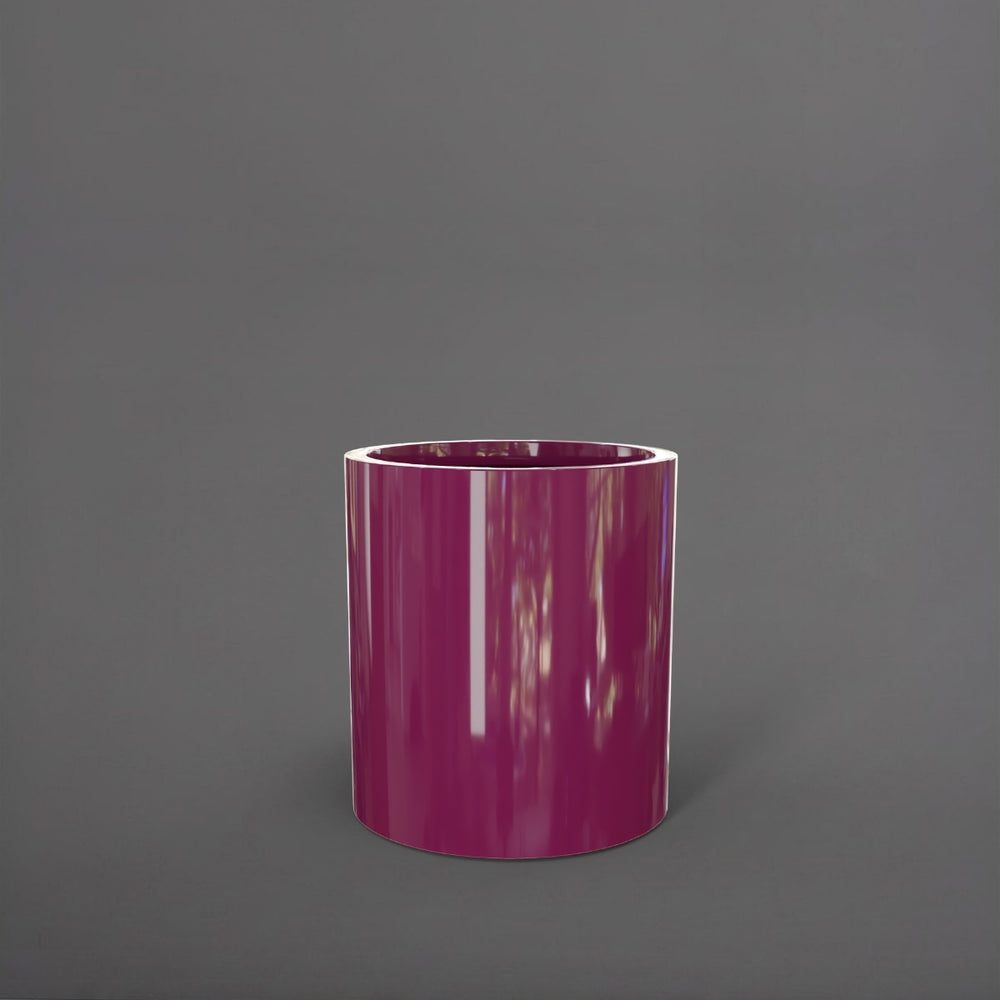 Rio Grande Cylinder Fiberglass Planter in gloss eggplant against gray background.