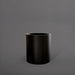 Rio Grande Cylinder Fiberglass Planter in matte black against gray background.