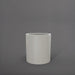 Rio Grande Cylinder Fiberglass Planter in matte cement grey against gray background.