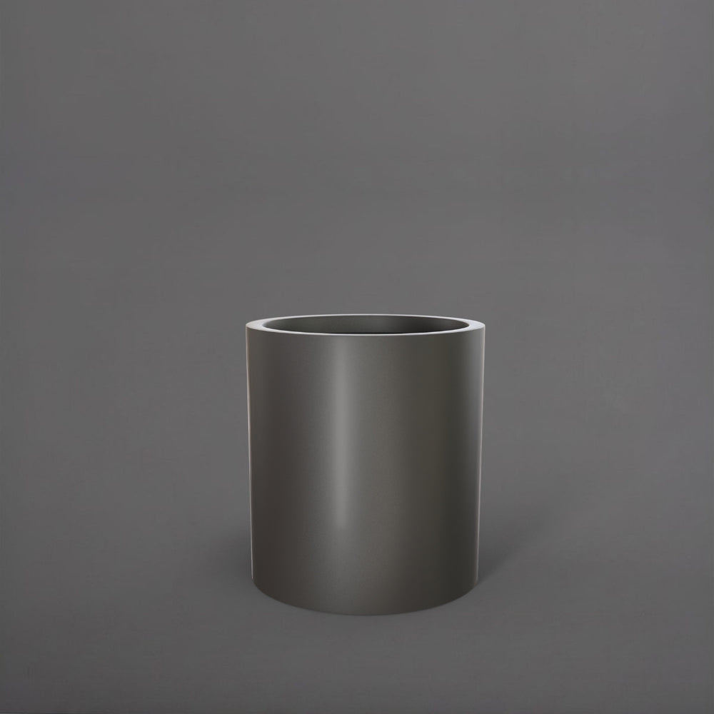 Rio Grande Cylinder Fiberglass Planter in matte gunmetal against gray background.