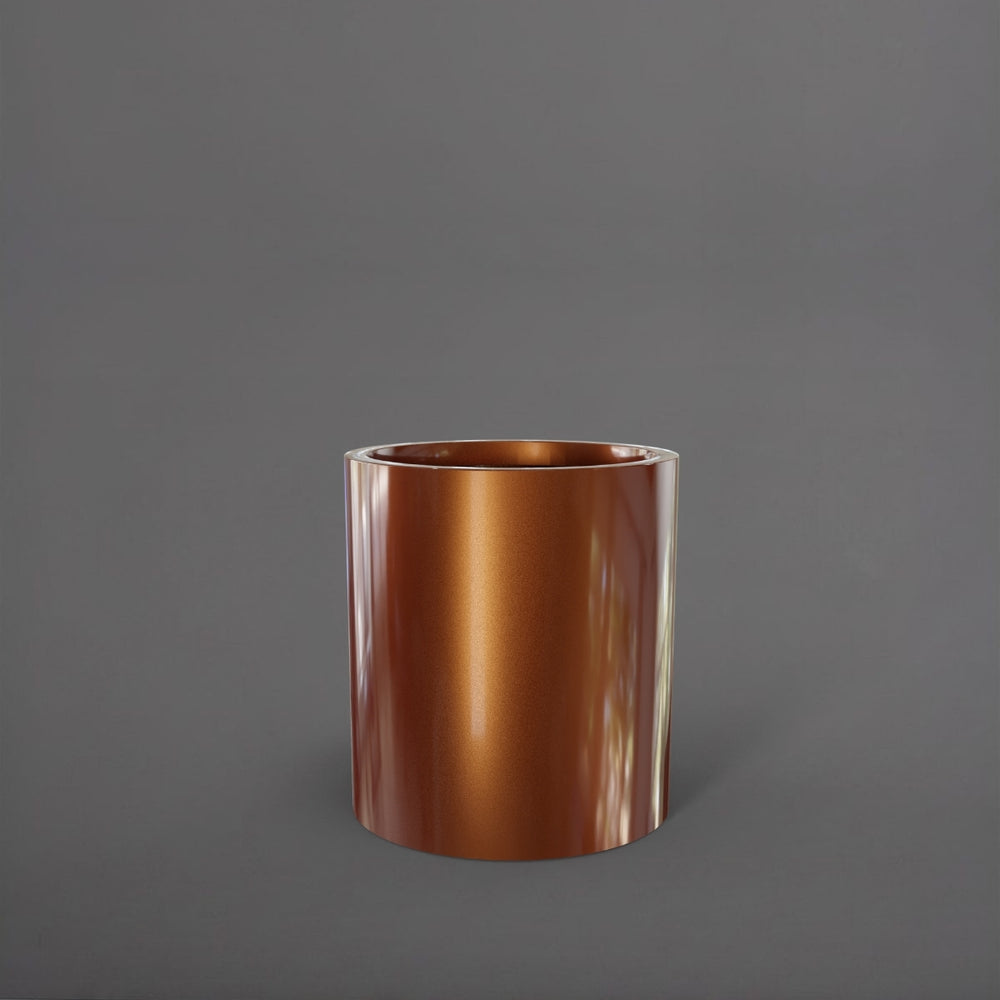 Rio Grande Cylinder Fiberglass Planter in metallic bronze against gray background.