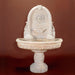 Robbiana Wall Fountain against brown background.