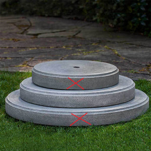 Round Plinth 25 on grass in the backyard