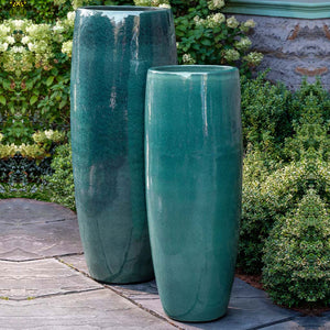 Sabine Planter, Tall - Fjord - S/1 on concrete beside plants