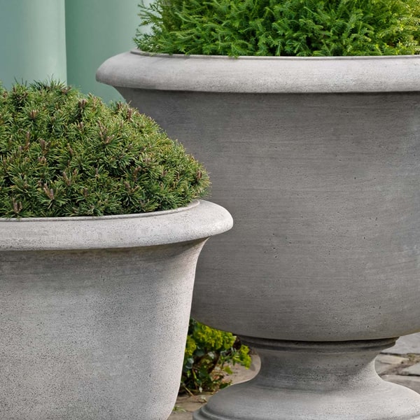 Sag Harbor Urn Planter, Large on concrete filled with plants upclose