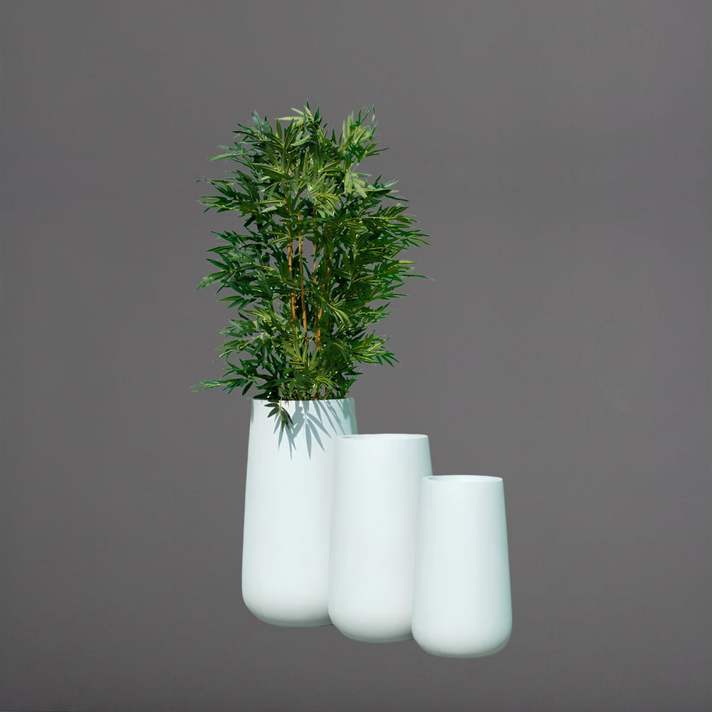 Saigon Tapered Round Fiberglass Planter shown in three different sizes.