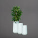 Saigon Tapered Round Fiberglass Planter shown in three different sizes.