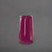 Saigon Tapered Round Fiberglass Planter in gloss eggplant against gray background.
