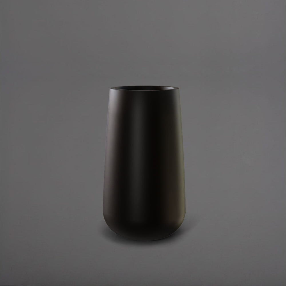 Saigon Tapered Round Fiberglass Planter in matte black against gray background.