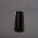Saigon Tapered Round Fiberglass Planter in matte black against gray background.