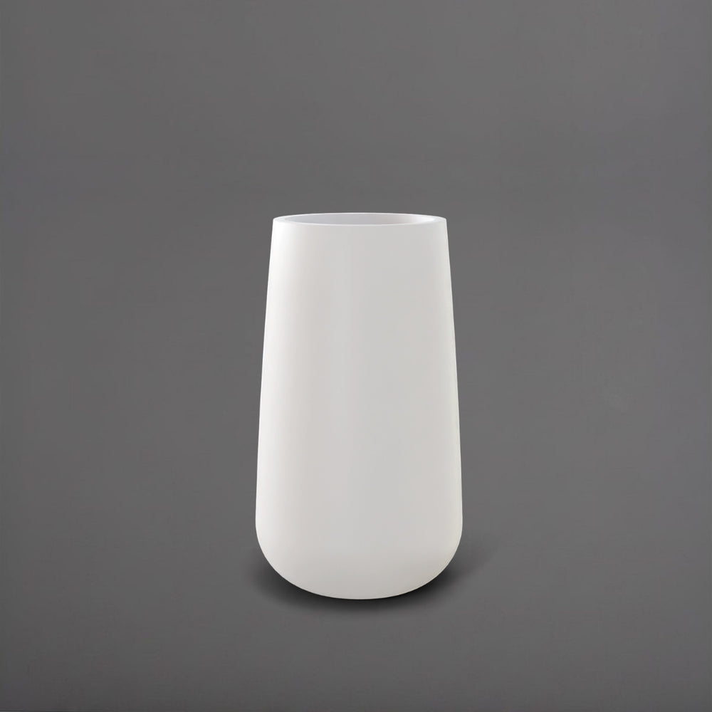 Saigon Tapered Round Fiberglass Planter in matte bright white against gray background.