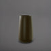 Saigon Tapered Round Fiberglass Planter in matte bronze against gray background.